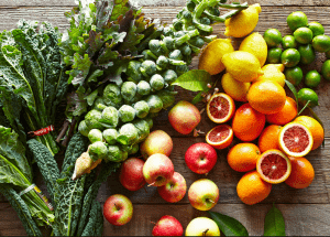 a group of fruits and vegetables on a wood surface Healthy Weight Loss Diets Wembley